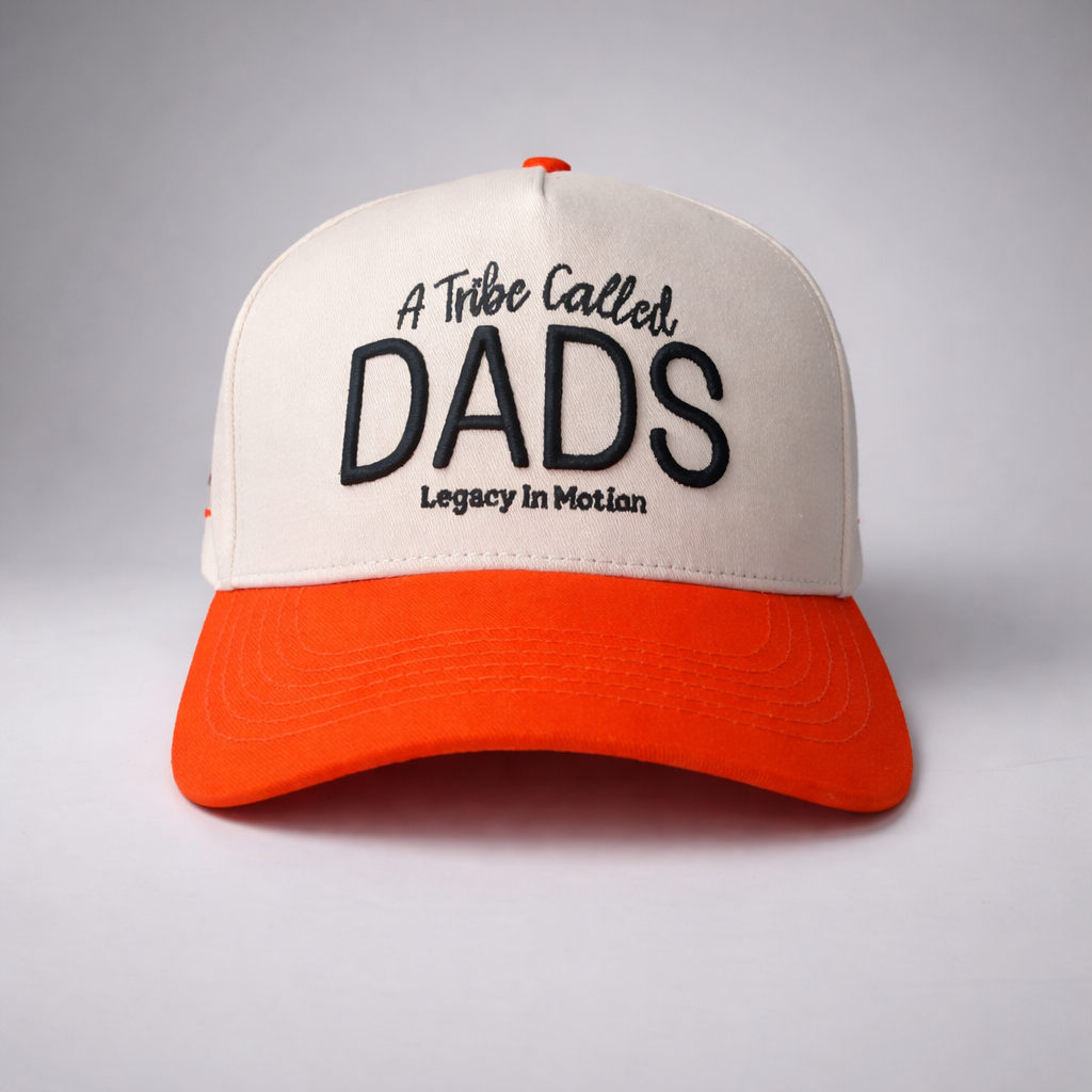 Cap with 'A Tribe Called DADS' text on a gray background