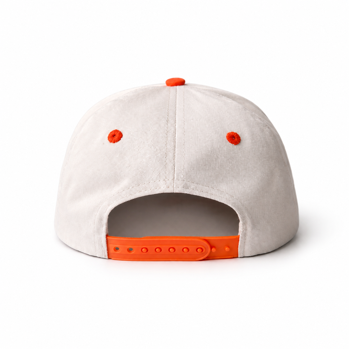 Beige cap with orange accents on a gray background