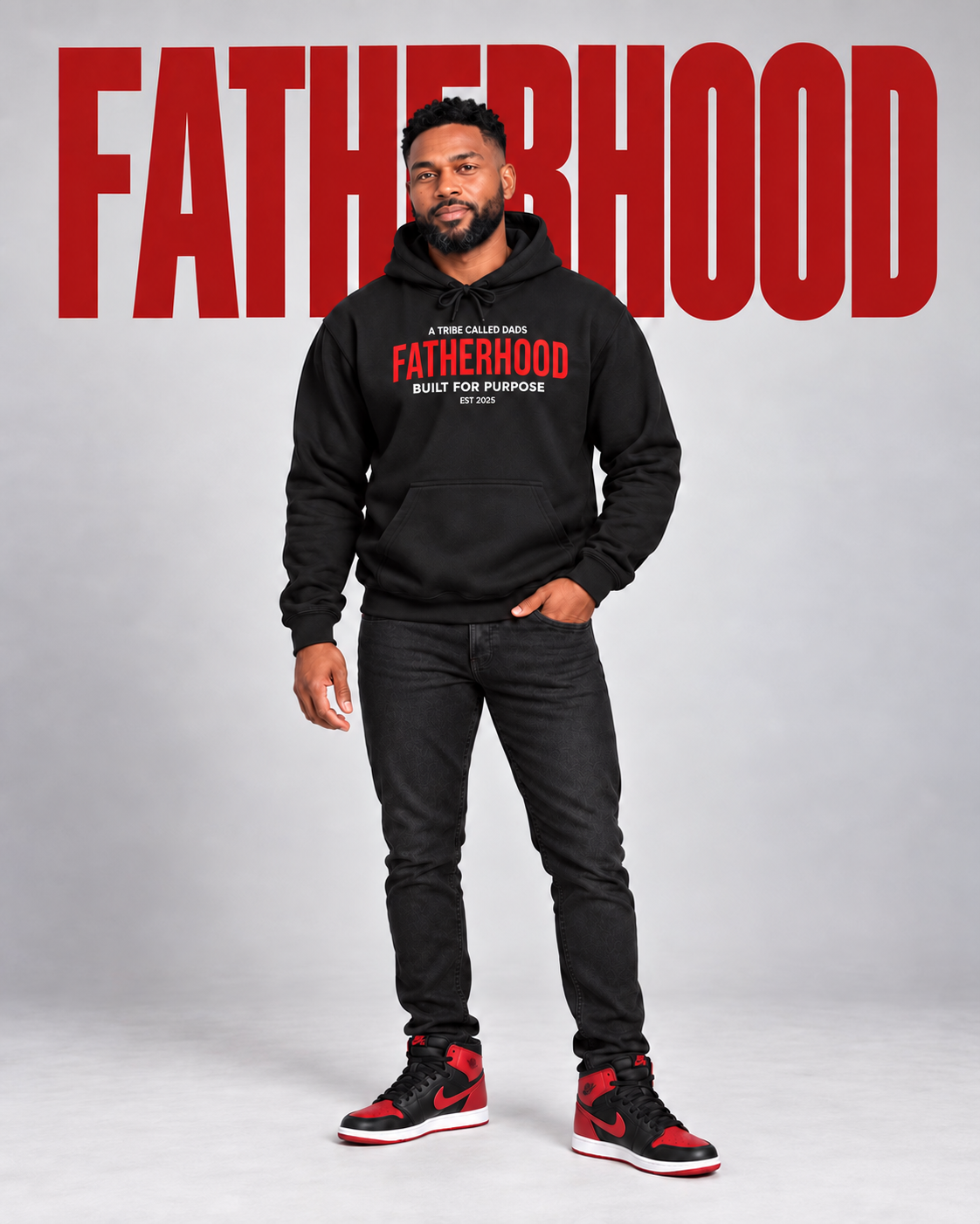 Model wearing the black Built For Purpose Fatherhood hoodie
